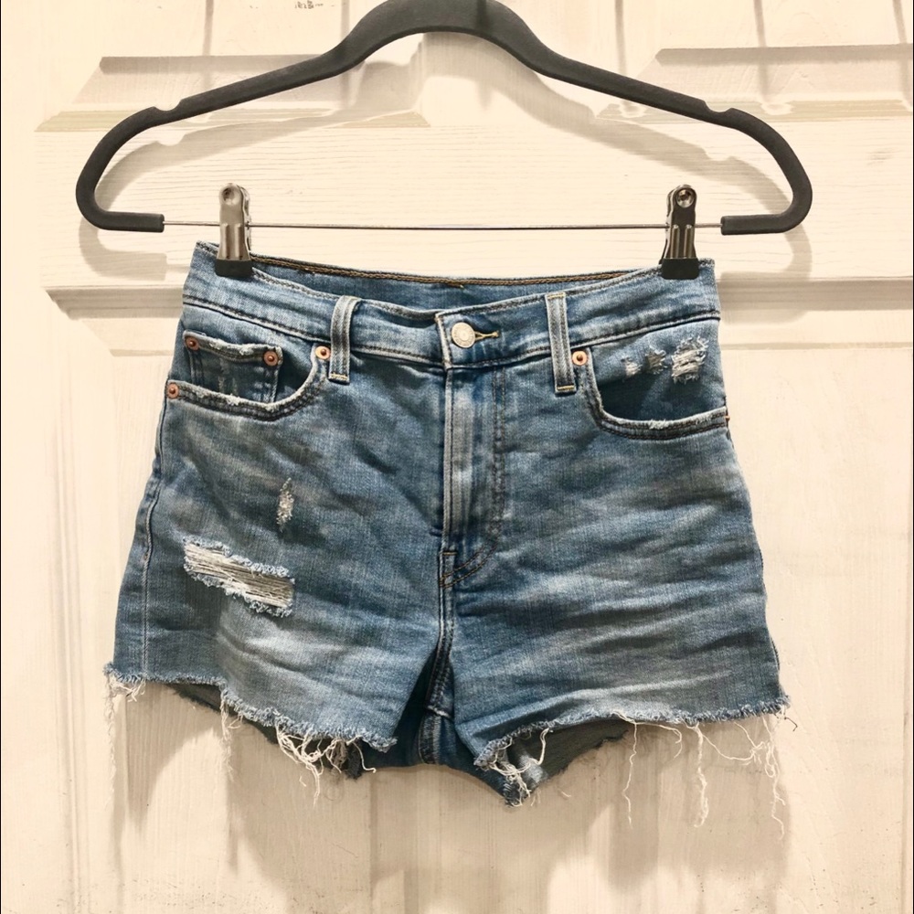 LEVI’S light wash high rise distressed shorts